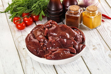 Raw chicken liver uncooked in the bowl