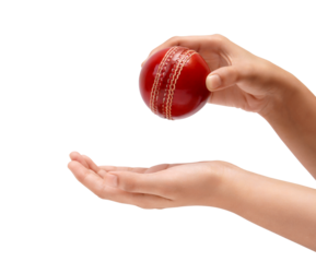 Hands holding and preparing to catch a red leather cricket ball against a