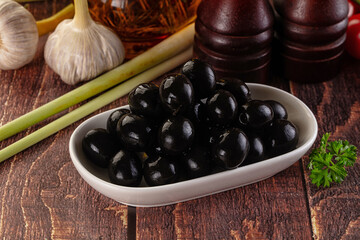 Mediterranean marinated Black olives in the bowl