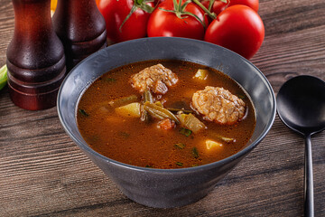 Tomato Soup with meatballs and vegetables