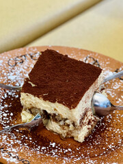 Tiramisu dessert with cocoa powder