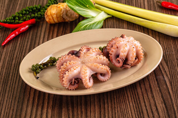 Gourmet Boiled octopus in the bowl © Andrei Starostin