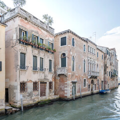 historical buildings on canal bank, Venezia, Italy