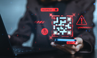 Cybersecurity concept showing a person scanning a fake QR code with warnings and virus symbols on a dark digital interface background.