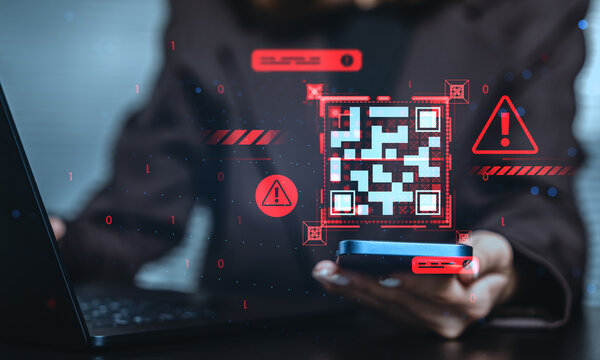 Cybersecurity concept showing a person scanning a fake QR code with warnings and virus symbols on a dark digital interface background.