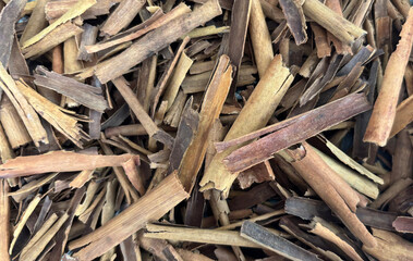 Broken Ceylon Cinnamon Textured Background, Cinnamomum Verum Bark Pieces Pattern