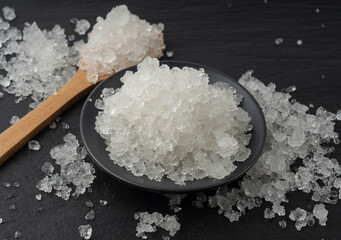 Dead sea salt pile, white crystals for body spa, sodium chloride similar to crushed ice, spa scrub
