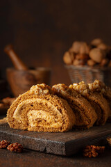 Walnut and buttercream roll: a traditional Oriental pastry.