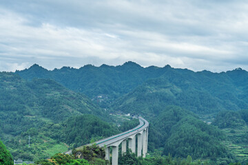 Highway bridge in green valley