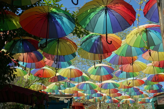 Colorful umbrellas across the street in Istanbul, in the Balat district