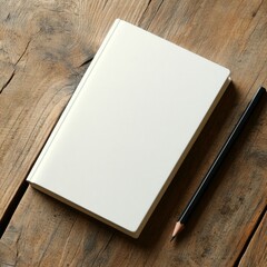 A notebook mockup with a custom cover design, lying on a wooden desk with a pencil