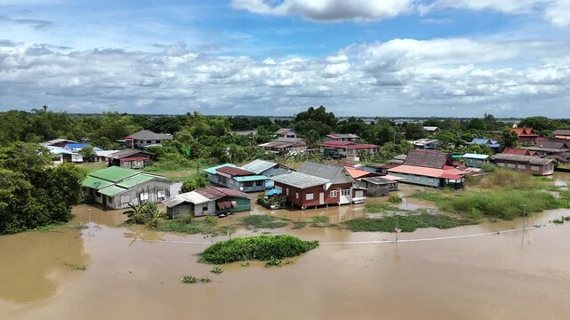 30,Sep,2025,Sena Ayutthaya, a storm and heavy rain caused water to overflow from the river and flood houses along the river called Mae Nam Noi in the rural area of Ayutthaya, Thailand.