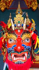 Ornate, colorful ceremonial mask