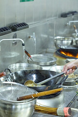 People and food Chefs in a busy Chinese kitchen