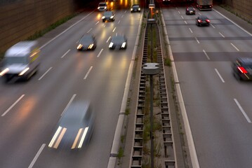 City highway in Berlin in the evening with cars in motion blur.