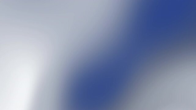 A blurry blue and white abstract image with indistinct shapes and smooth gradients