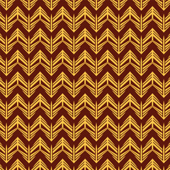 Elegant geometric pattern in gold and deep maroon abstract design