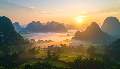 Scenic Mountain Range at Sunrise with Misty Valley and Warm Sunlight Casting Shadows on Lush Greenery and Rural Settlement in the Distance