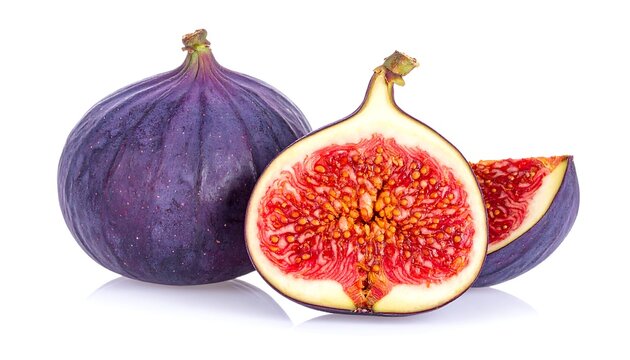 A vibrant still-life photograph showcases fresh figs. One whole fig alongside a cut fig reveal the fruit's interior, with one more piece in the shot