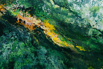 Abstract textured painting with green and yellow tones, expressive brushstrokes and natural patterns resembling landscape from above.