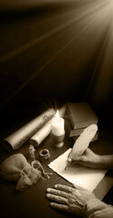 Man writing a letter on a desk