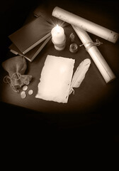Paper and quill on the table