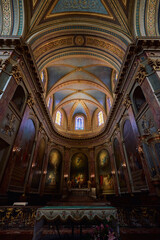 Ornate church interior in toulouse france with vaulted ceiling