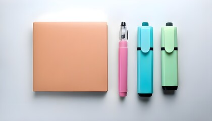 Pink notebook, pink pen, blue and green highlighter isolated on white background