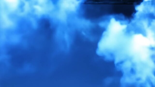 Abstract scene featuring blue atmosphere and clouds with smoke near the top