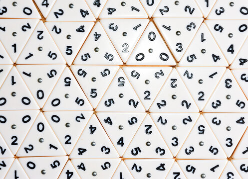 Triominos traangular  tiles with numbers background