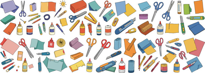 Colorful collection of stationery supplies including scissors, glue, and paper for crafting.