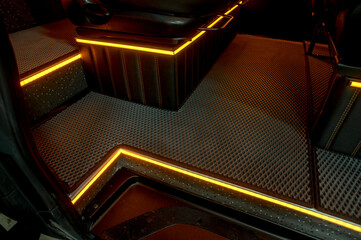 Comfortable interior of a passenger bus with soft seats