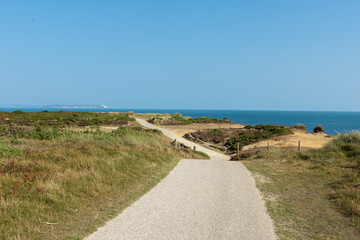 Hengistbury Head, Southbourne, UK - August 10th 2025: Footpath on Warren Hill with the sea in the background.