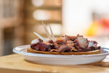 Polbo a feira, a traditional Galician octopus dish, in restaurant