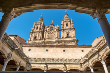 Courtyard of Casa de las Conchas with La Clerecia church view Salamanca Spain