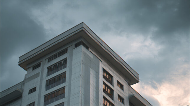 exploring the architectural simplicity and functional design of a typical government office building in an urban landscape showcasing everyday civic life and community engagement