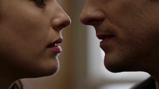 Close Up Of A Man And Woman Preparing To Kiss Each Other In The Late Afternoon