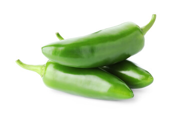 Many green jalapeno peppers isolated on white