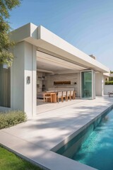 Fototapeta premium Modern house with outdoor dining area and pool