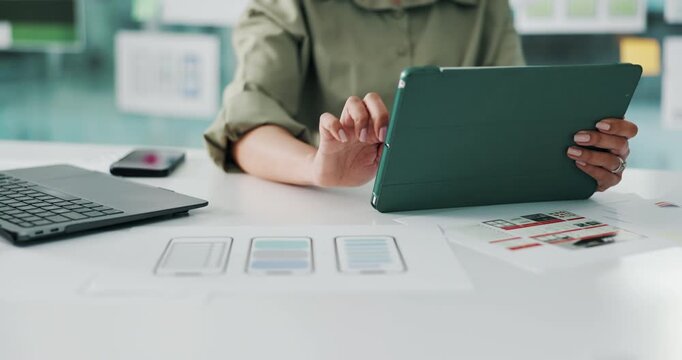 Person, hands and app designer with wireframes on tablet for UI design, UX or development in office. Software engineer, documents or planning with technology for mobile application or digital project