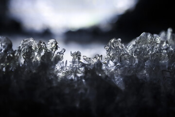 Sparkling ice crystal formation, macro view revealing intricate detail and delicate texture. cold...