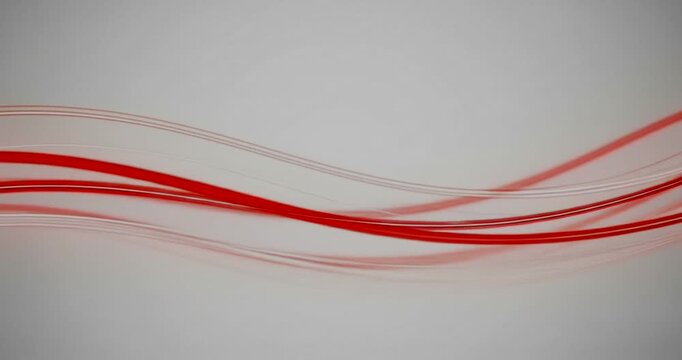 Abstract red wave patterns flowing across a soft gray background