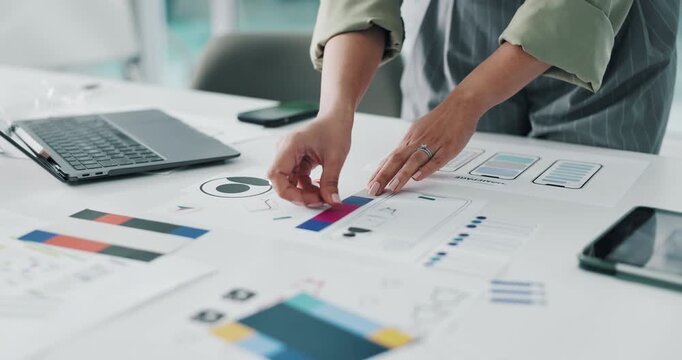 Creative person, hands and planning with wireframes or swatches for app design in office. Designer, software engineer or developer with documents, color palette or technology for mobile platform