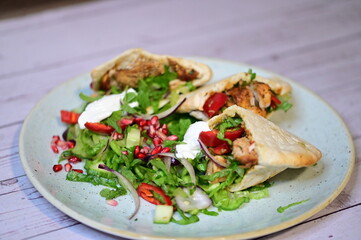 turkish kebab on plate with pita bread