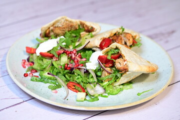 turkish kebab on plate with pita bread