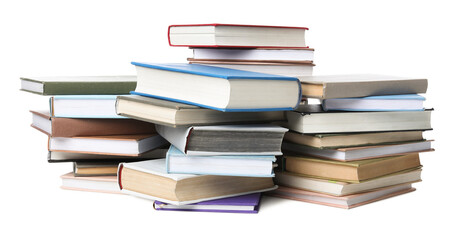 Stacks of many books isolated on white