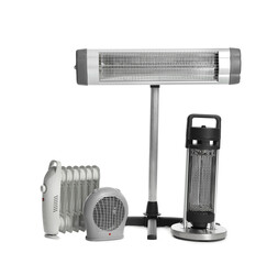 Different modern electric heaters isolated on white