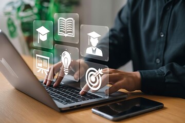 Person using laptop with digital education icons floating above keyboard