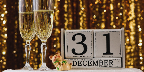 Year end - december - New year  celebration with two glasses of wine and party mode on 31st december
