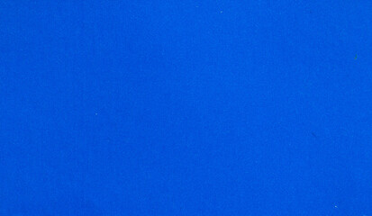Blue paper texture background. Smooth surface with subtle fiber details, minimalist plain sheet for craft projects and design use.